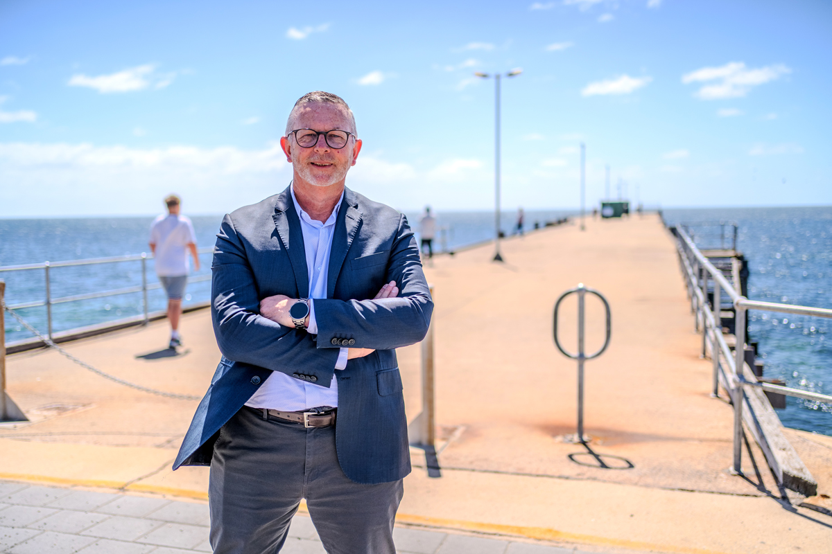 Yorke Peninsula Mayor Darren Braund standing in front of the jetty