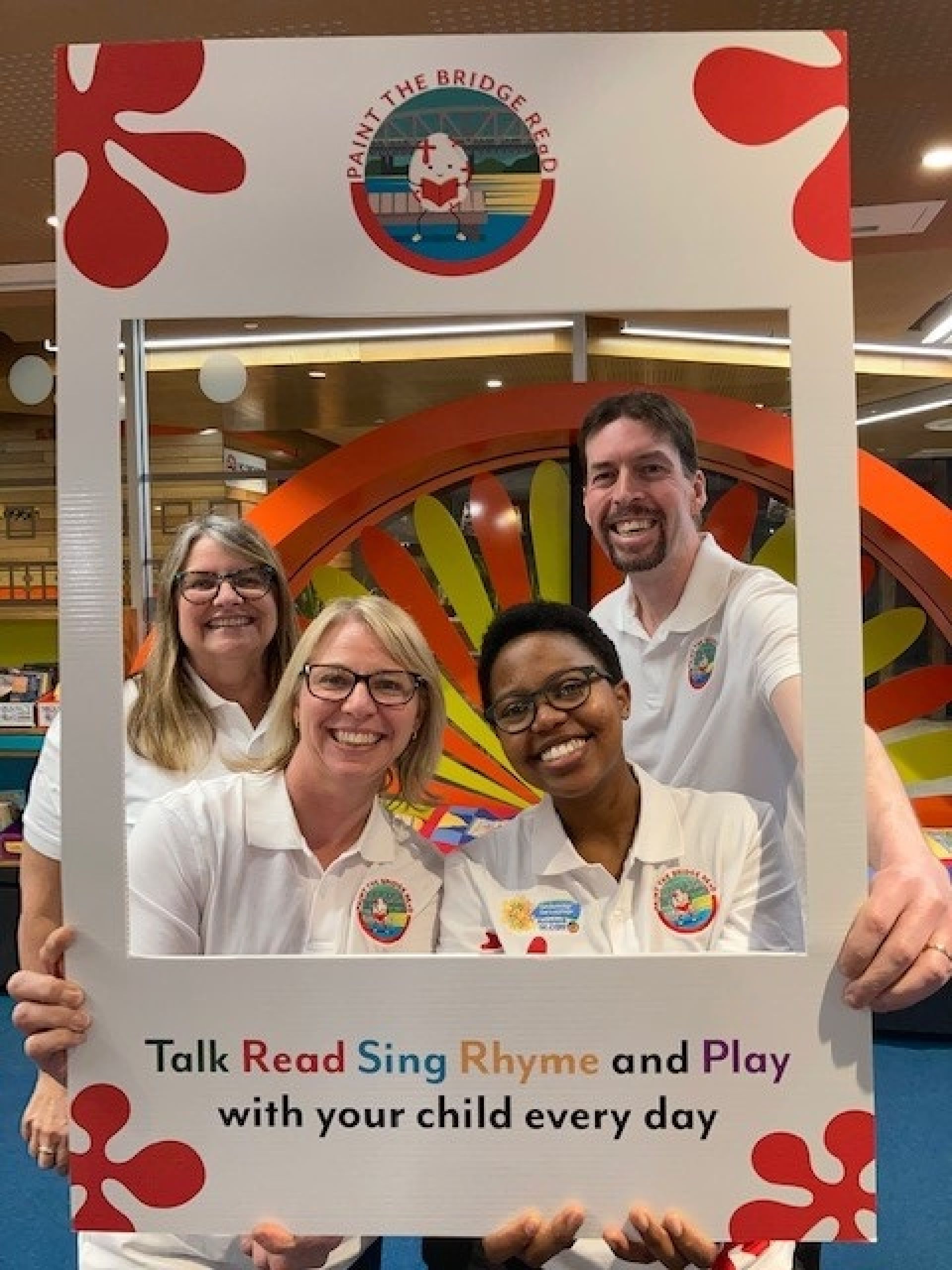 Photo of four of the Paint the town Read library staff 