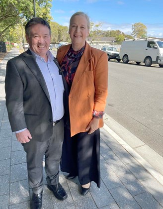 LGA President, Dean Johnson and Charles Sturt Mayor Angela Evans standing next to a road.
