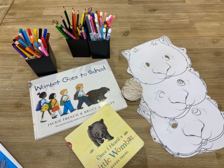 Example of the themed craft activities at the library - texters, a book and masks